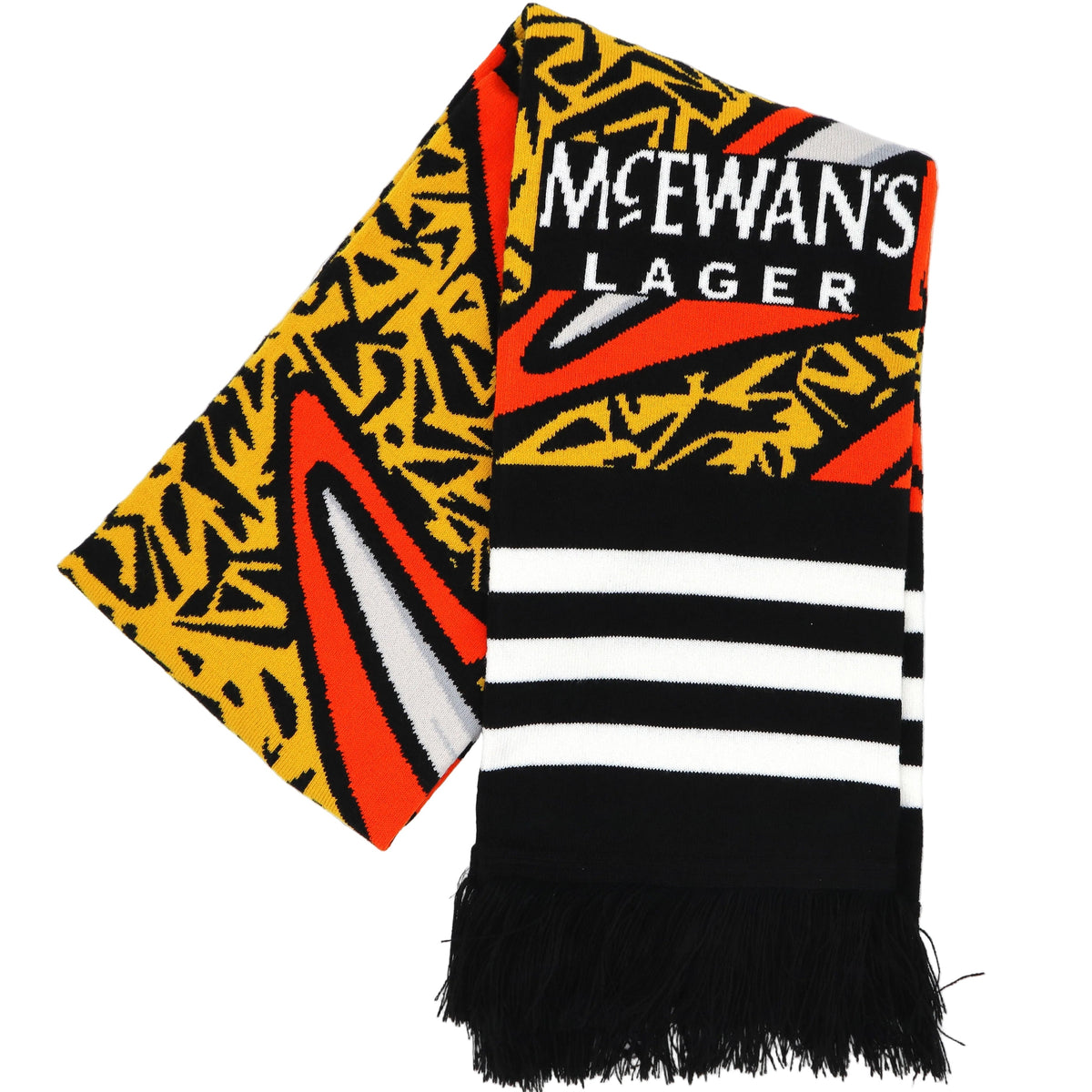 A sports scarf featuring the text 'MCEWAN'S LAGER' in white on a black background, with a yellow, black, and red abstract pattern on one side and black and white stripes with black fringe on the other, shown on a plain white background.